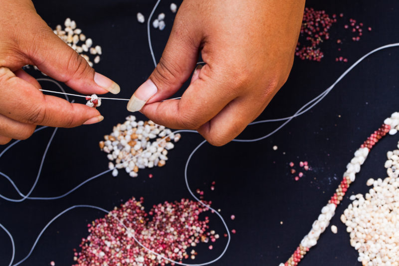 Making a beautiful Niihau shell lei