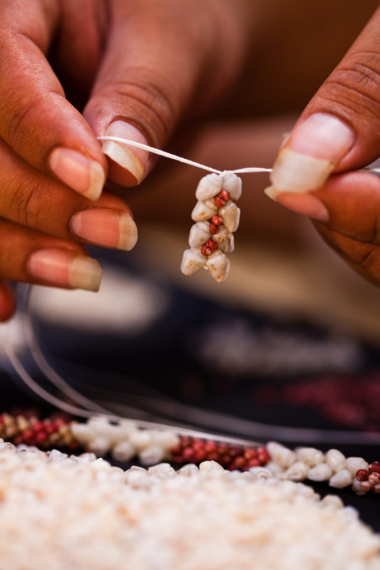 A Niihau shell lei in the making - authentic Hawaiian souvenirs