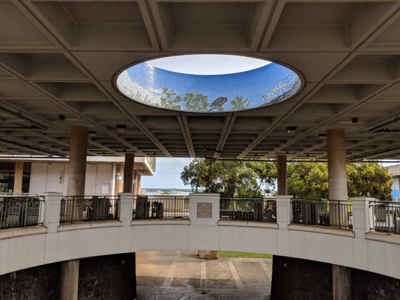 The Best Lookout For Pearl Harbor Ships Is At Leeward Community College - A tile art piece featuring the island view and a black-crowned night heron.