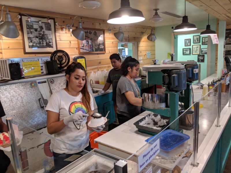 Matsumoto Shave Ice staff hard at work. They have a really good system going on and efficiency is key to serve more than 1000 shave ice each day.