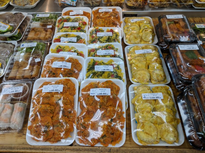 Saranwrapped side dishes and bentos (boxed lunches) are yummy at Palama super market.