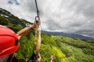 Zooming down while ziplining in Hawaii.