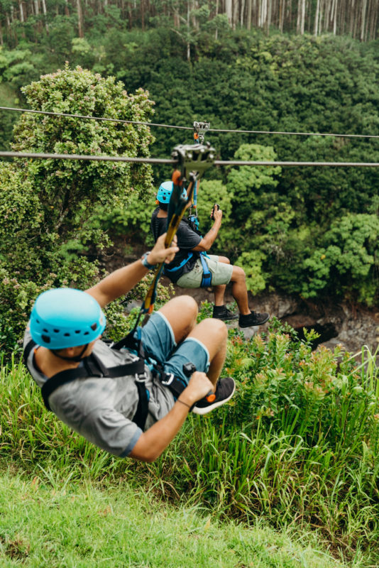 Racing down while ziplining in Hawaii.