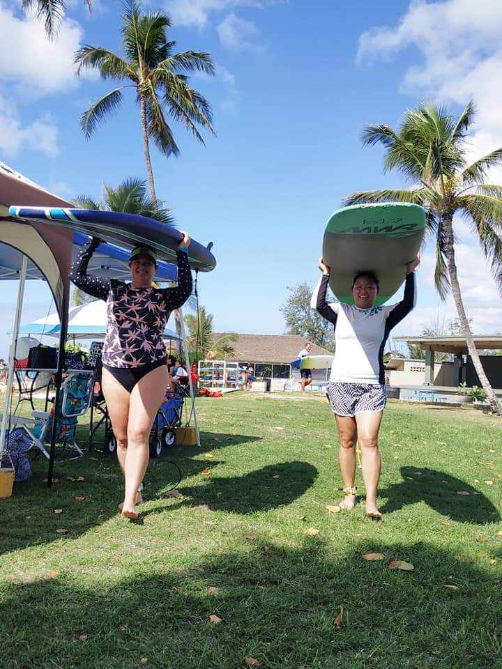 Getting ready for my surf lesson at White Plains Beach.