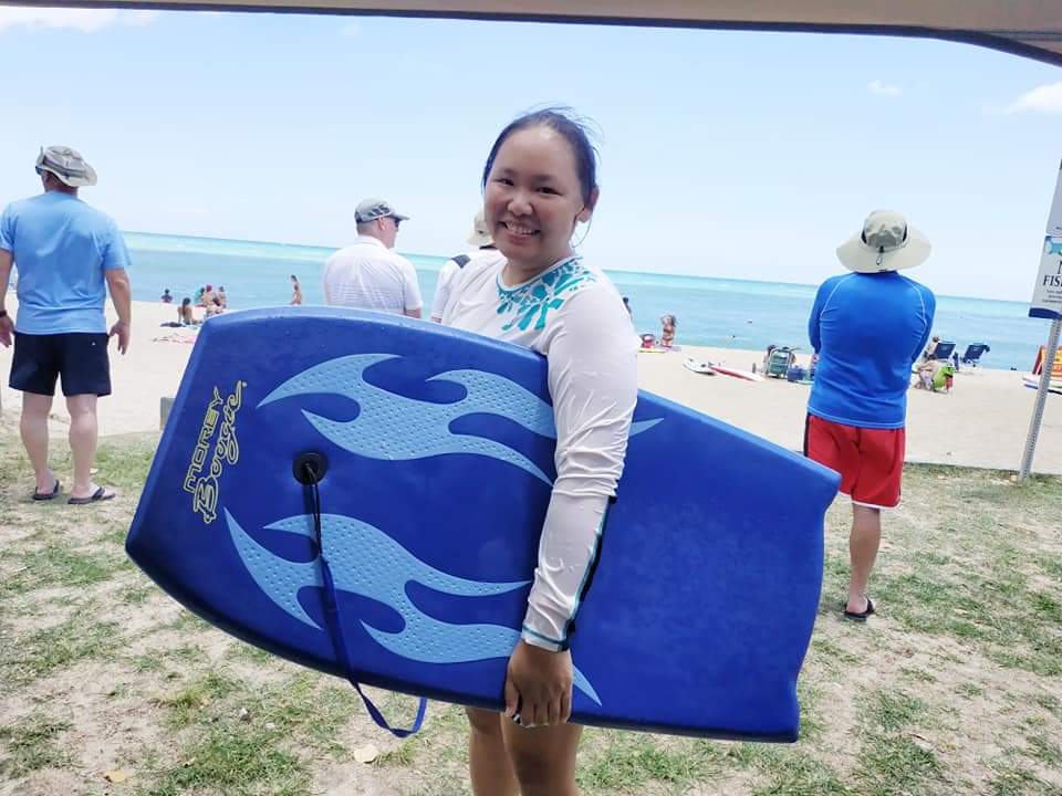 Returning from boogie boarding at White Plains Beach.