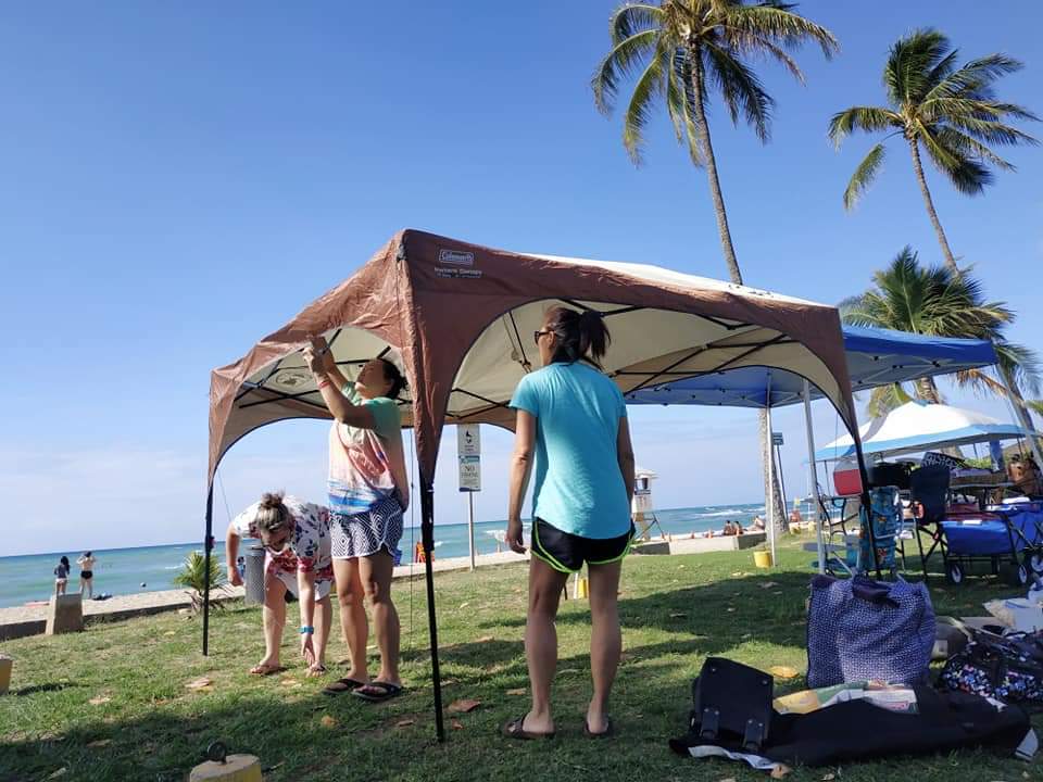 Setting up our tents as soon as we arrived at White Plains Beach.