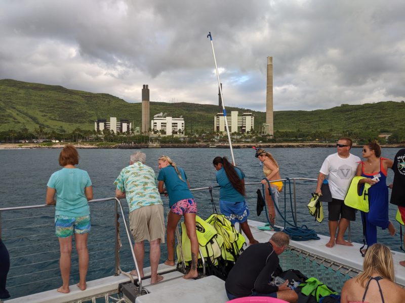 Anchoring the Kai Oli Oli to our snorkel spot. The staff also spotted a sea turtle at this time so a few of us were watching it swim.