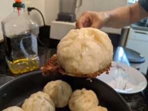 Take out the baozi when there's a nice brown crust.