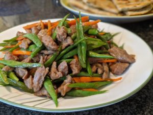 Pork, green beans and carrots stir fry
