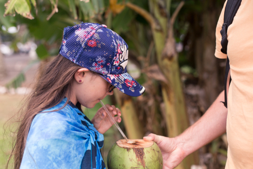 Drinking fresh coconut!