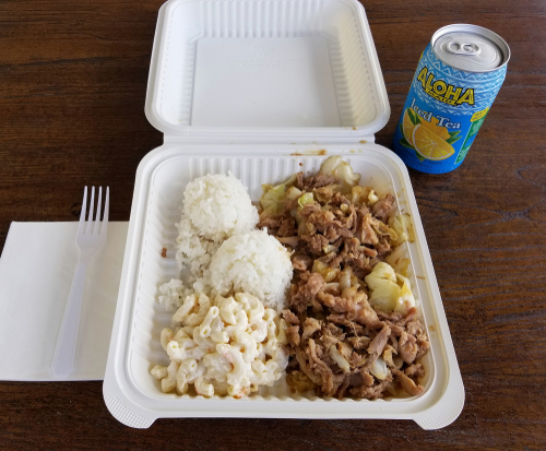 A kalua pig and cabbage plate lunch at Hanalei with a can of cold ice tea! Editorial credit: Bill Morson / Shutterstock.com