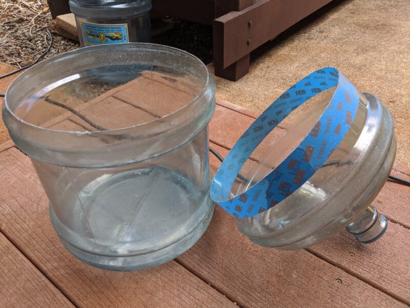 Cut the water jug into two pieces. The bottom is the fish tank and the top is the grow bed.