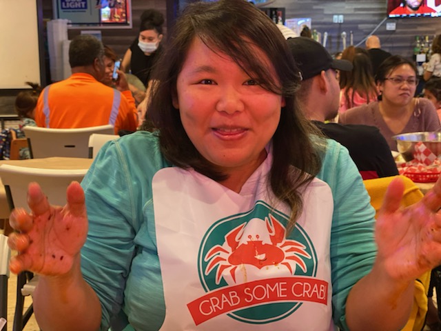 Photo Credit: My friend Sarah couldn't resist taking a photo of me after I had finished off my crab. A hands dirty, oil dripping off my chin, hair in my face photo.