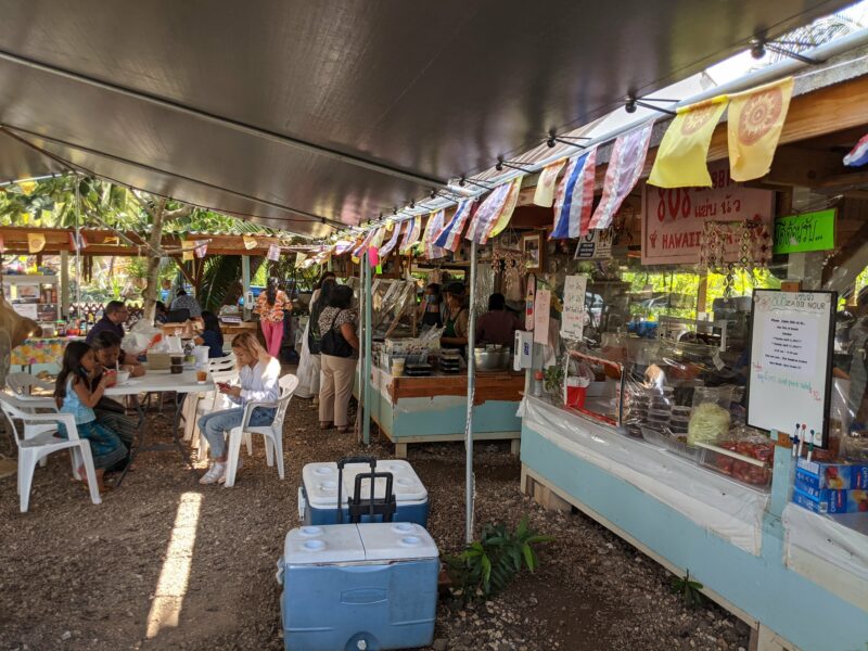 Under the large tent you'll find the main booths selling the more authentic dishes popular with the local Thai community.