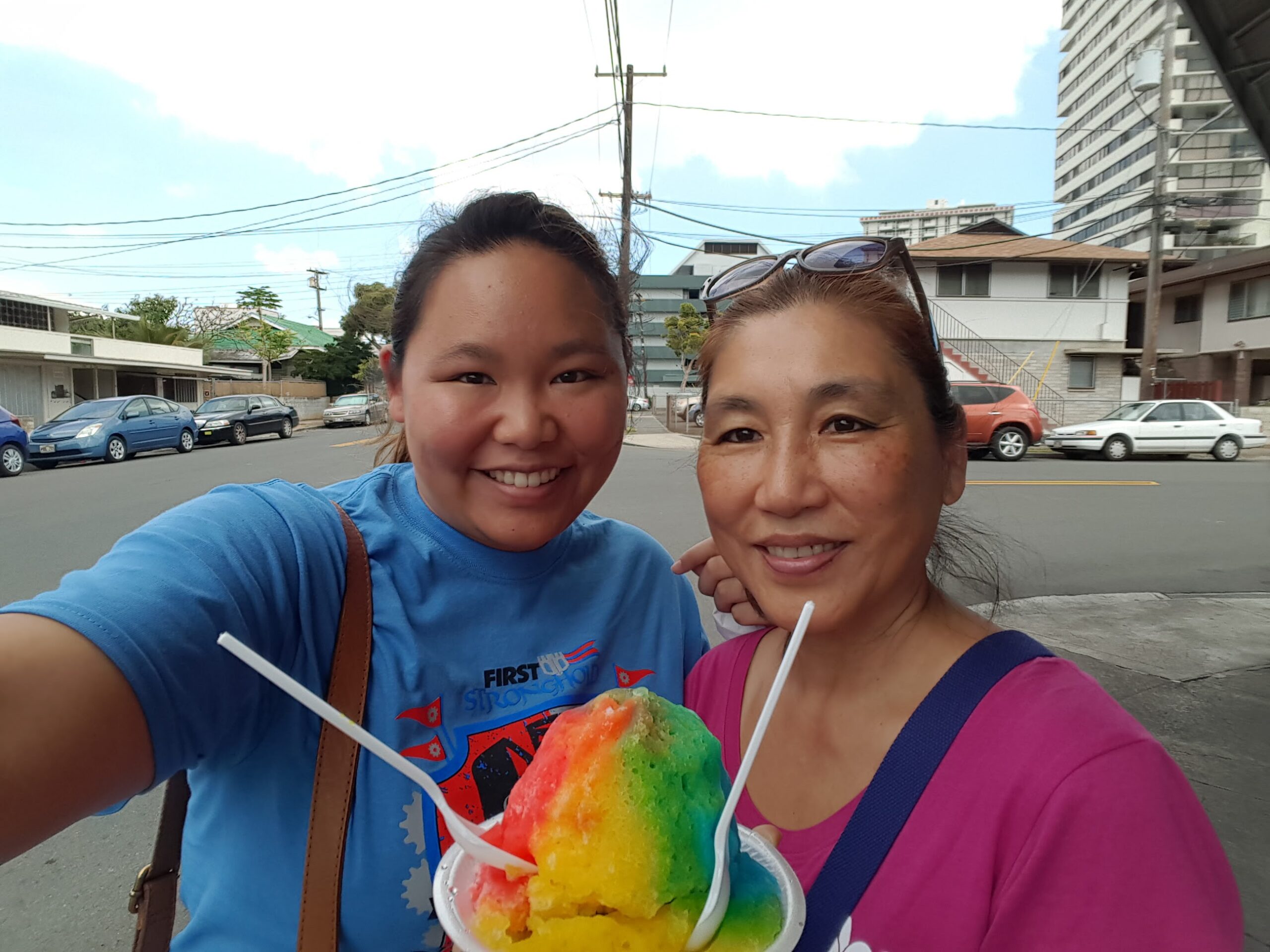 Amy with her Mom and shave ice.