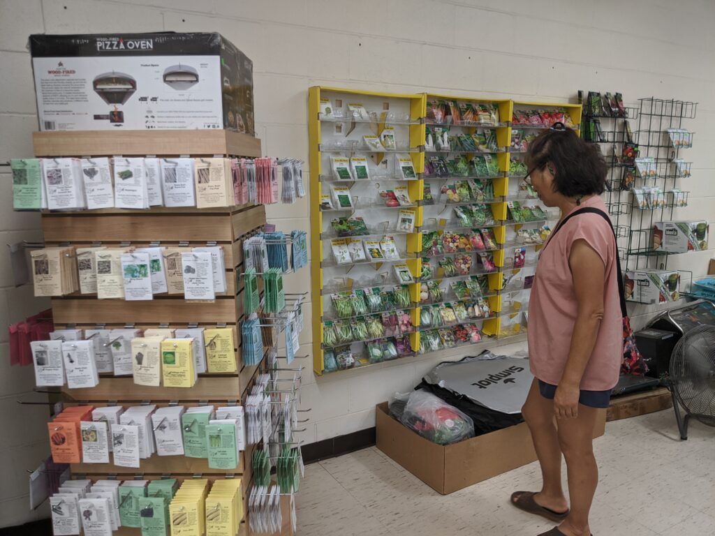 Mom taking a look at the seed variety at Koolau Farmers on South Beretania Street.