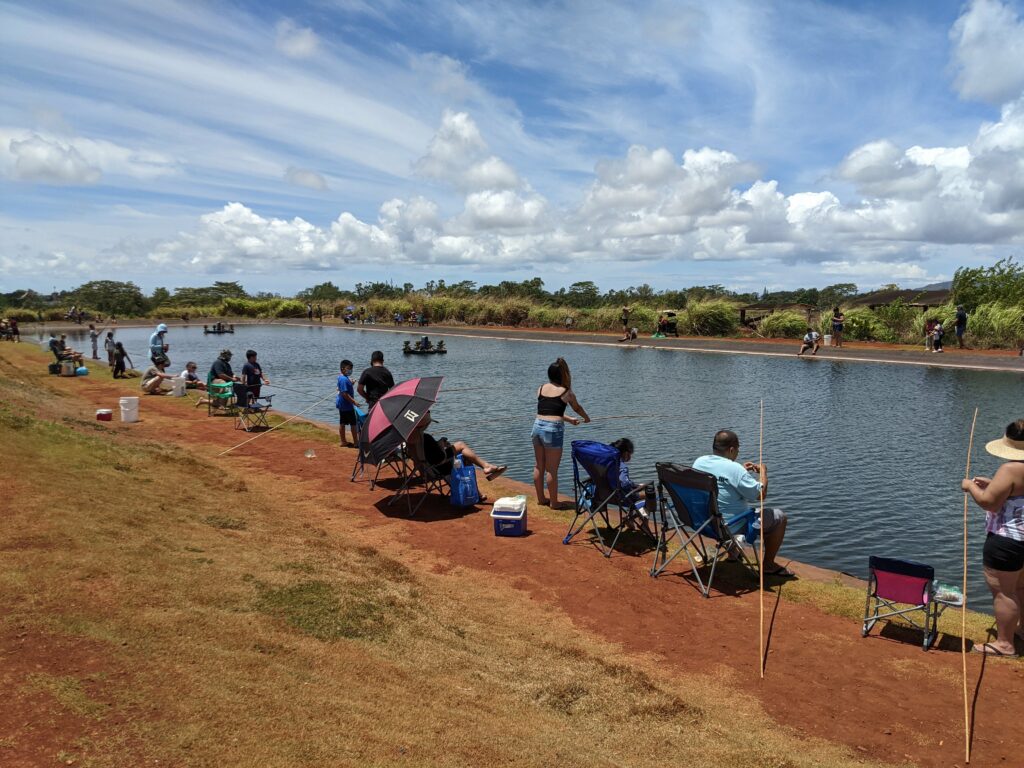 Fishing for the first time at Alii Agriculture farms.