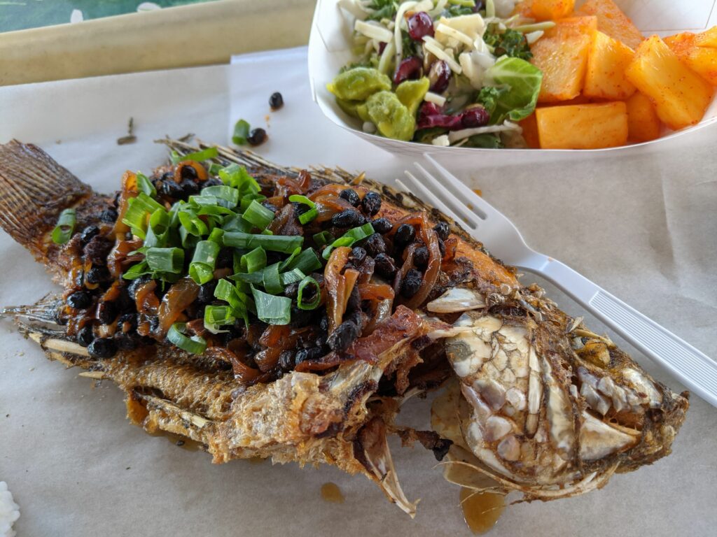 Deep-fried tilapia with black beans.