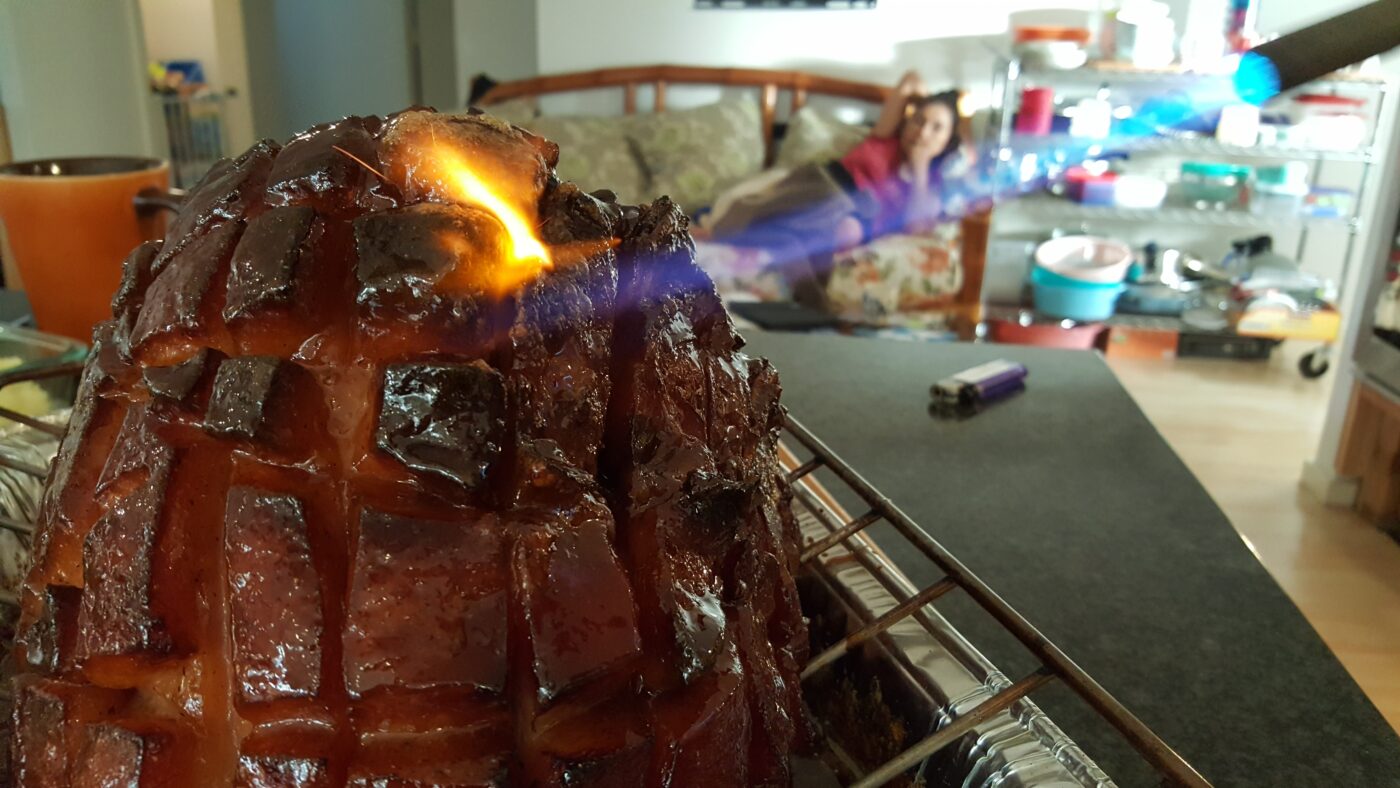 Glazing the ham.
