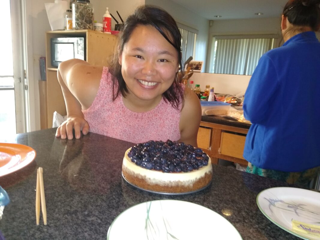 Amy with blueberry cheesecake.