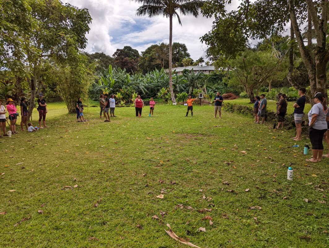 People standing in a large circle.