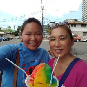 Amy with her Mom and shave ice.
